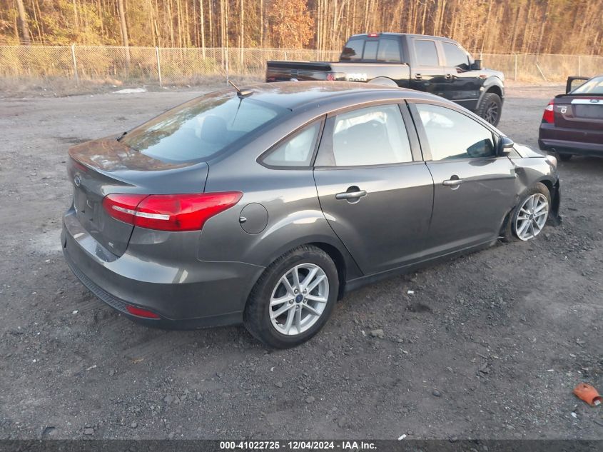 VIN 1FADP3F24HL233077 2017 FORD FOCUS no.4