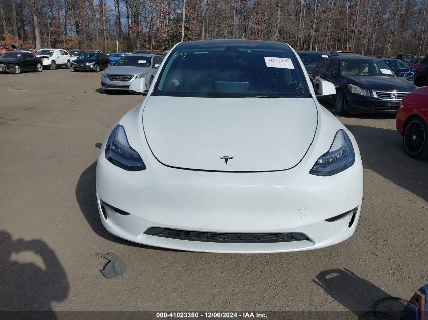 2023 Tesla Model Y Awd/Long Range Dual Motor All-Wheel Drive VIN: 7SAYGAEE1PF584061 Lot: 41023350