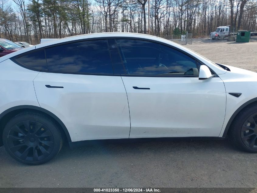 2023 Tesla Model Y Awd/Long Range Dual Motor All-Wheel Drive VIN: 7SAYGAEE1PF584061 Lot: 41023350