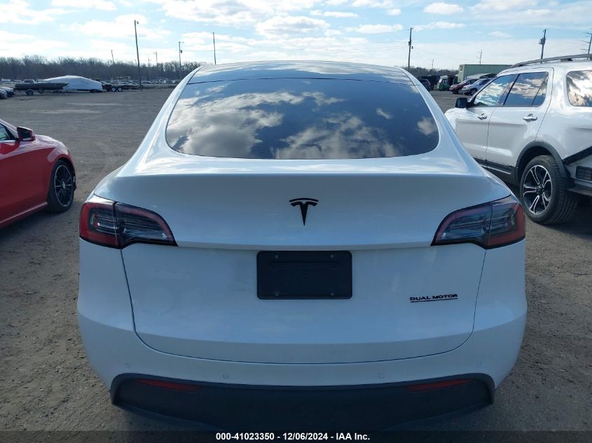 2023 Tesla Model Y Awd/Long Range Dual Motor All-Wheel Drive VIN: 7SAYGAEE1PF584061 Lot: 41023350