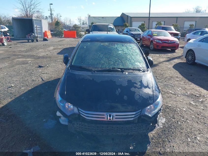 2011 Honda Insight Ex VIN: JHMZE2H72BS002554 Lot: 41023639