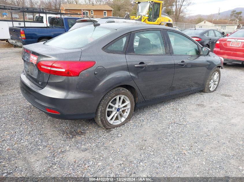 VIN 1FADP3F22JL298922 2018 Ford Focus, SE no.4