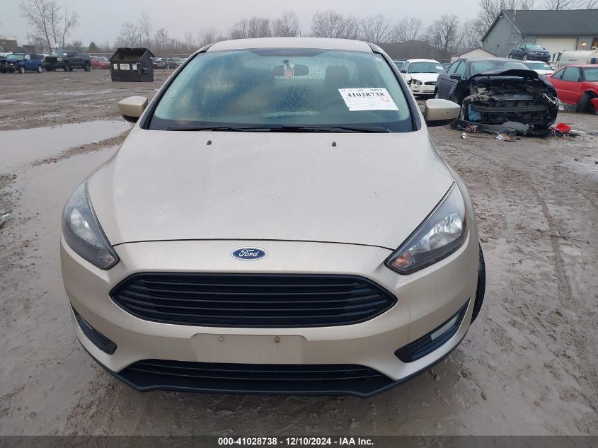 VIN 1FADP3FE2JL235197 2018 Ford Focus, SE no.12