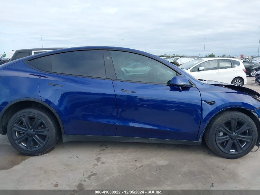 2023 Tesla Model Y Awd/Long Range Dual Motor All-Wheel Drive VIN: 7SAYGDEE4PF890463 Lot: 41030922