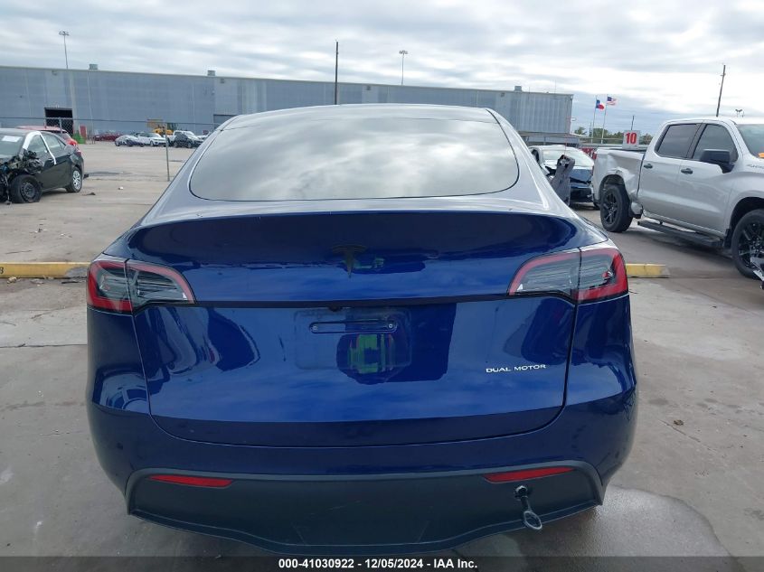 2023 Tesla Model Y Awd/Long Range Dual Motor All-Wheel Drive VIN: 7SAYGDEE4PF890463 Lot: 41030922