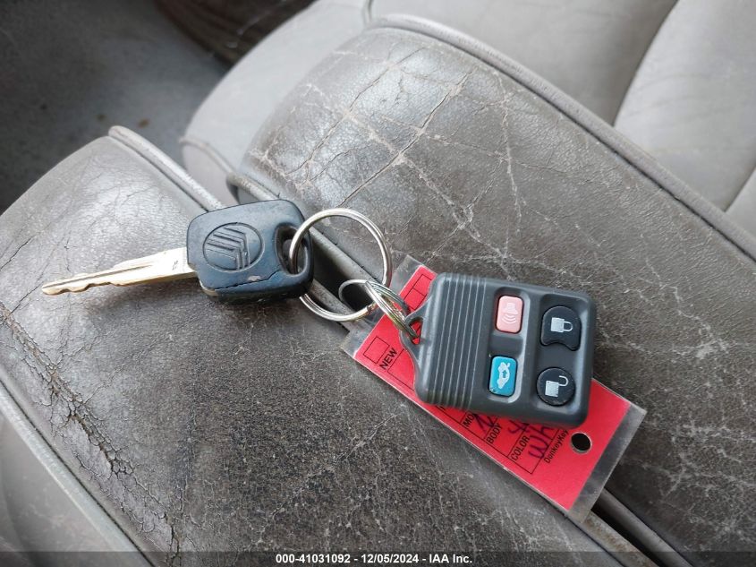 1999 Mercury Grand Marquis Ls VIN: 2MEFM75W3XX673122 Lot: 41031092