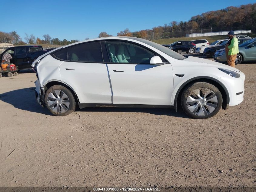 2023 Tesla Model Y Awd/Long Range Dual Motor All-Wheel Drive VIN: 7SAYGDEE5PA174328 Lot: 41031868