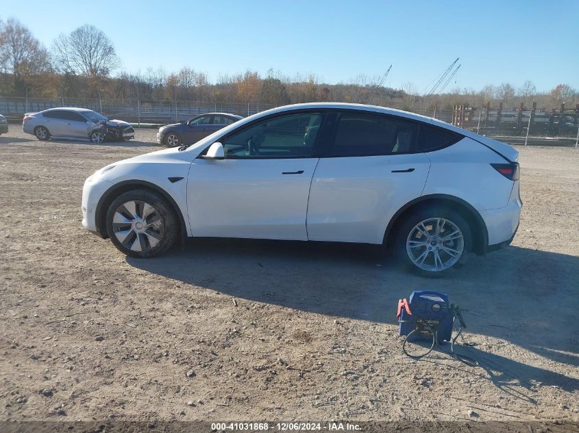 2023 Tesla Model Y Awd/Long Range Dual Motor All-Wheel Drive VIN: 7SAYGDEE5PA174328 Lot: 41031868