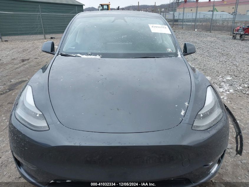 2023 Tesla Model Y Awd/Long Range Dual Motor All-Wheel Drive VIN: 7SAYGAEE2PF940887 Lot: 41032334