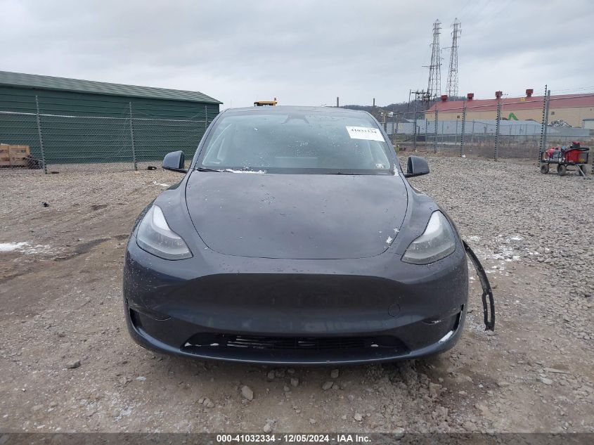 2023 Tesla Model Y Awd/Long Range Dual Motor All-Wheel Drive VIN: 7SAYGAEE2PF940887 Lot: 41032334