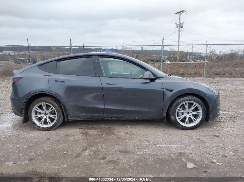 2023 Tesla Model Y Awd/Long Range Dual Motor All-Wheel Drive VIN: 7SAYGAEE2PF940887 Lot: 41032334