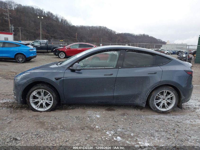 2023 Tesla Model Y Awd/Long Range Dual Motor All-Wheel Drive VIN: 7SAYGAEE2PF940887 Lot: 41032334