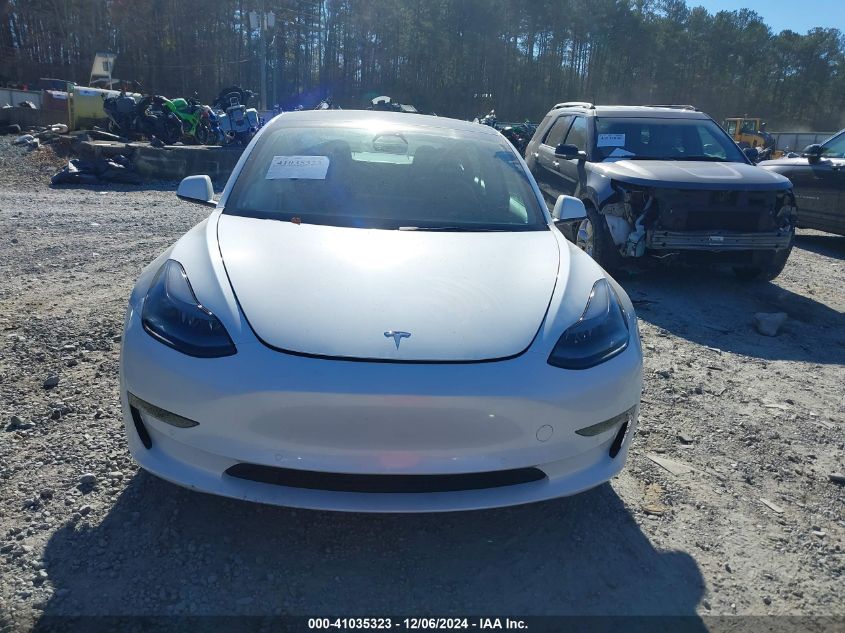 2021 Tesla Model 3 Standard Range Plus Rear-Wheel Drive VIN: 5YJ3E1EA7MF086856 Lot: 41035323