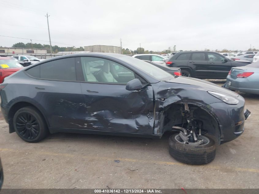 2023 Tesla Model Y Awd/Long Range Dual Motor All-Wheel Drive VIN: 7SAYGDEE2PF687541 Lot: 41036142