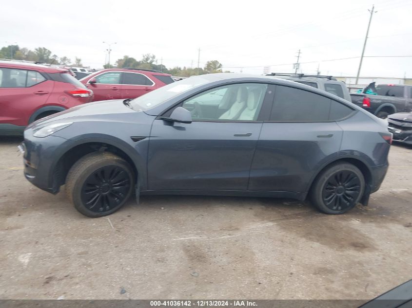 2023 Tesla Model Y Awd/Long Range Dual Motor All-Wheel Drive VIN: 7SAYGDEE2PF687541 Lot: 41036142