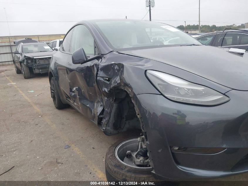 2023 Tesla Model Y Awd/Long Range Dual Motor All-Wheel Drive VIN: 7SAYGDEE2PF687541 Lot: 41036142