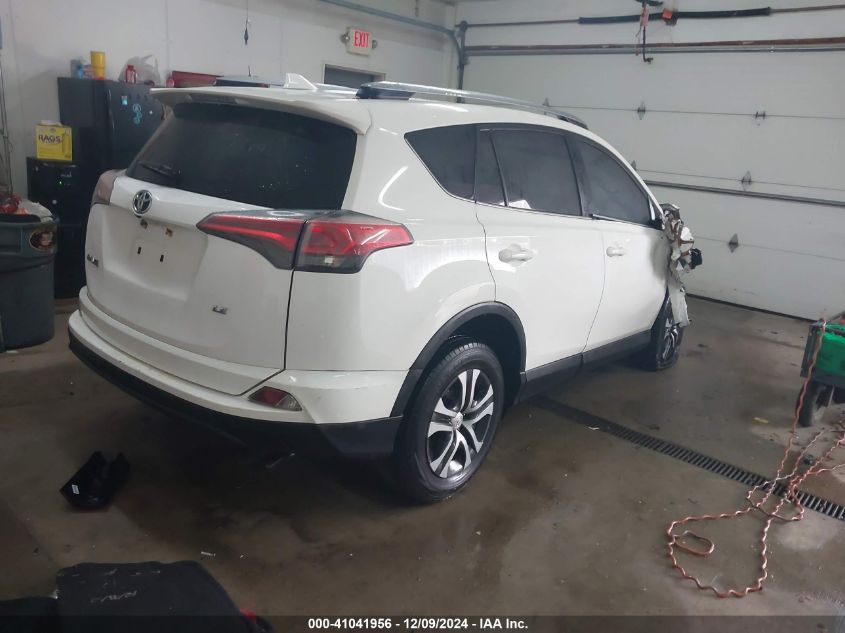 VIN JTMZFREV3HJ105930 2017 TOYOTA RAV4 no.4