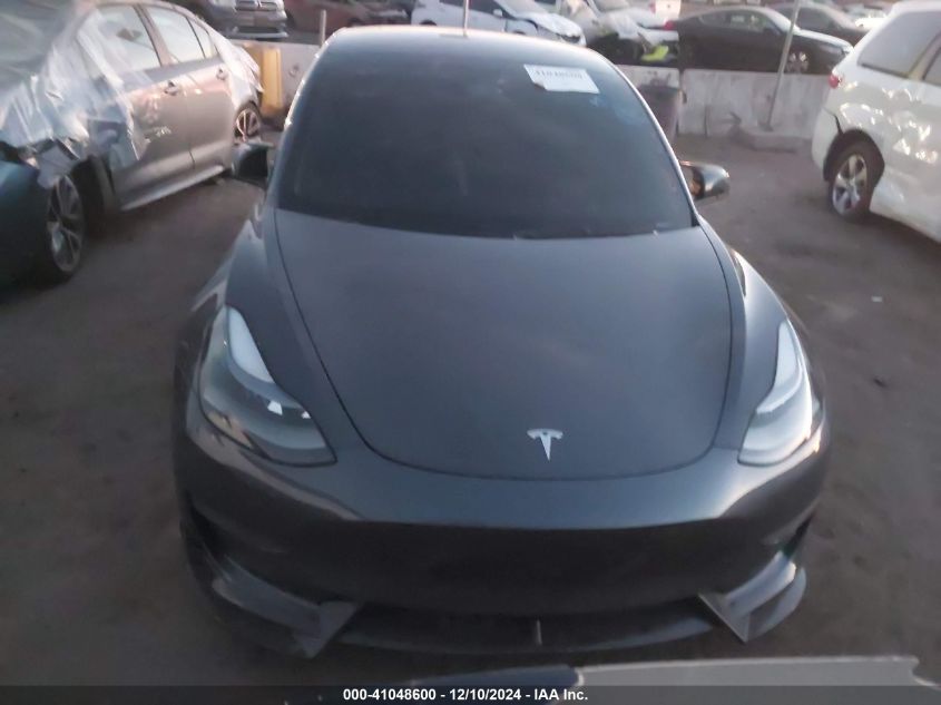 2023 Tesla Model 3 Long Range Dual Motor All-Wheel Drive VIN: 5YJ3E1EB4PF633935 Lot: 41048600