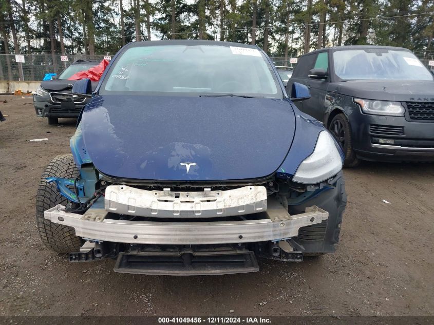 2022 Tesla Model Y Long Range Dual Motor All-Wheel Drive VIN: 7SAYGDEE8NF376077 Lot: 41049456