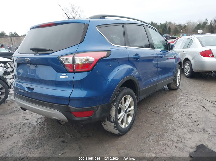 VIN 1FMCU9GD0JUC99459 2018 FORD ESCAPE SE