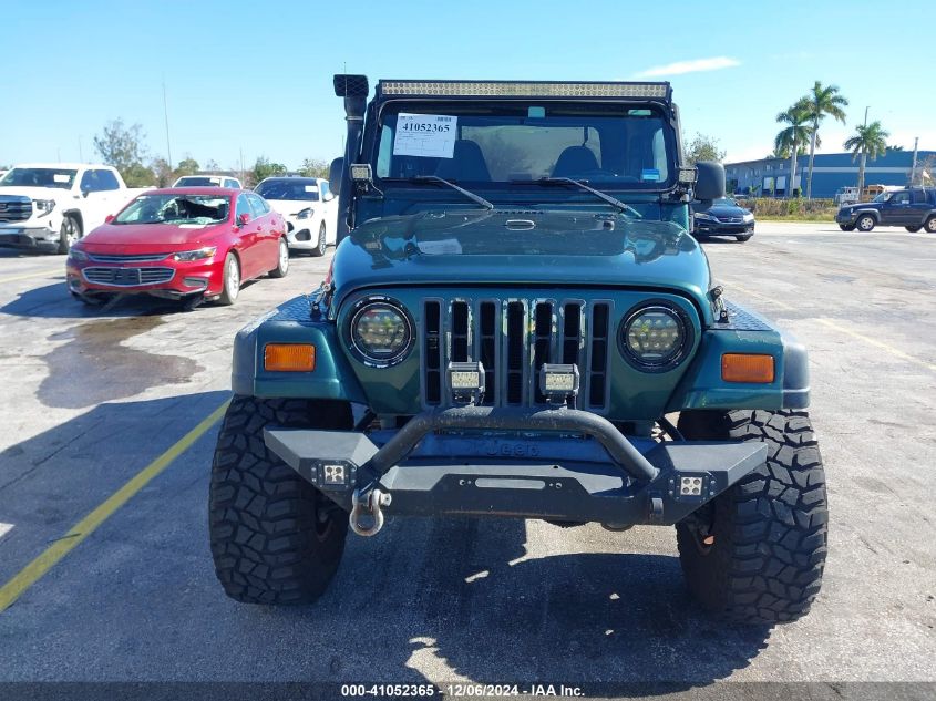 1999 Jeep Wrangler Sahara VIN: 1J4FY49S1XP418545 Lot: 41052365
