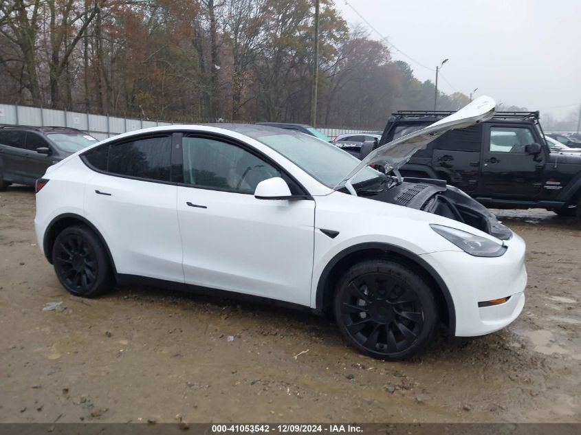 2024 Tesla Model Y Long Range Dual Motor All-Wheel Drive/Rwd VIN: 7SAYGDED4RF101092 Lot: 41053542