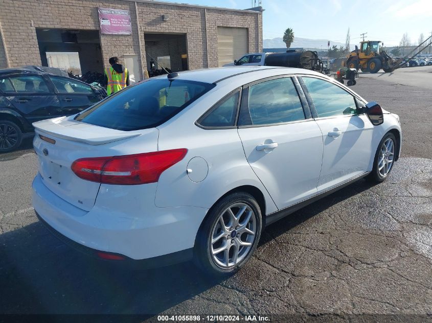 VIN 1FADP3F24FL319177 2015 FORD FOCUS no.4