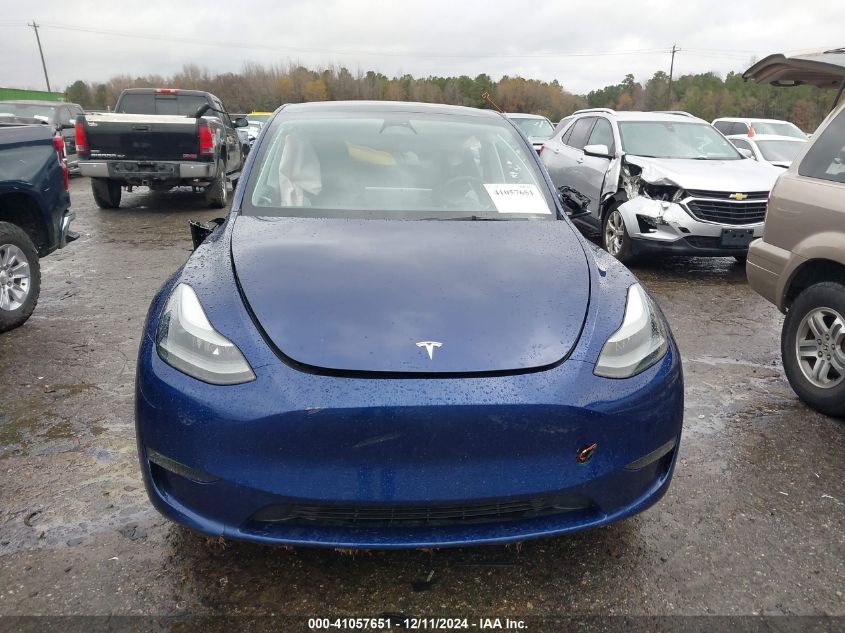 2023 Tesla Model Y Awd/Long Range Dual Motor All-Wheel Drive VIN: 7SAYGDEE7PF673988 Lot: 41057651