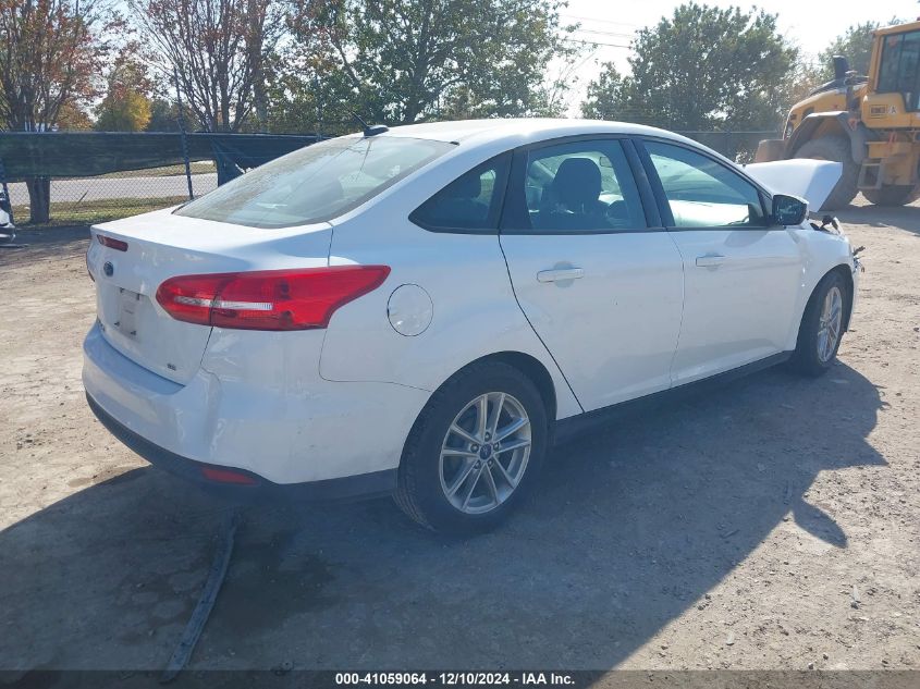 VIN 1FADP3F2XHL347388 2017 Ford Focus, SE no.4