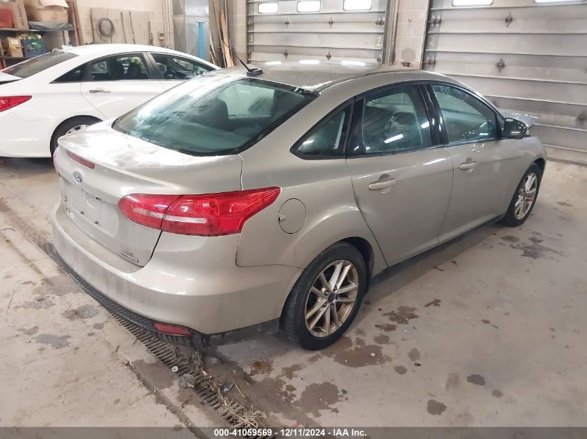 VIN 1FADP3F2XFL239320 2015 Ford Focus, SE no.4