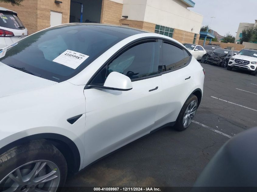 2023 Tesla Model Y Performance Dual Motor All-Wheel Drive VIN: 7SAYGDEF3PA048834 Lot: 41059987