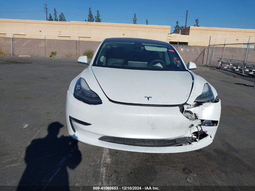 2018 Tesla Model 3 Long Range/Mid Range VIN: 5YJ3E1EA9JF076096 Lot: 41060653