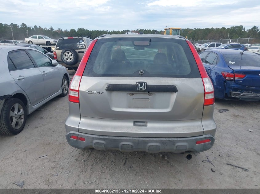 2007 Honda Cr-V Lx VIN: JHLRE38397C052070 Lot: 41062133