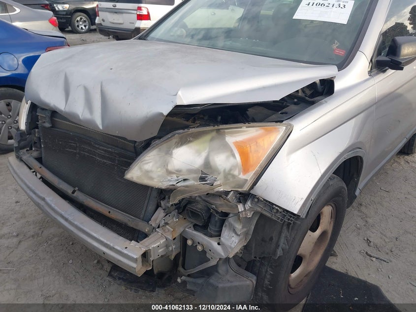 2007 Honda Cr-V Lx VIN: JHLRE38397C052070 Lot: 41062133