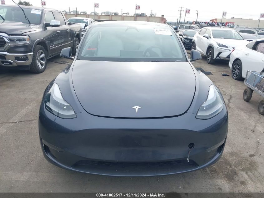 2023 Tesla Model Y Awd/Long Range Dual Motor All-Wheel Drive VIN: 7SAYGDEE0PF884546 Lot: 41062517