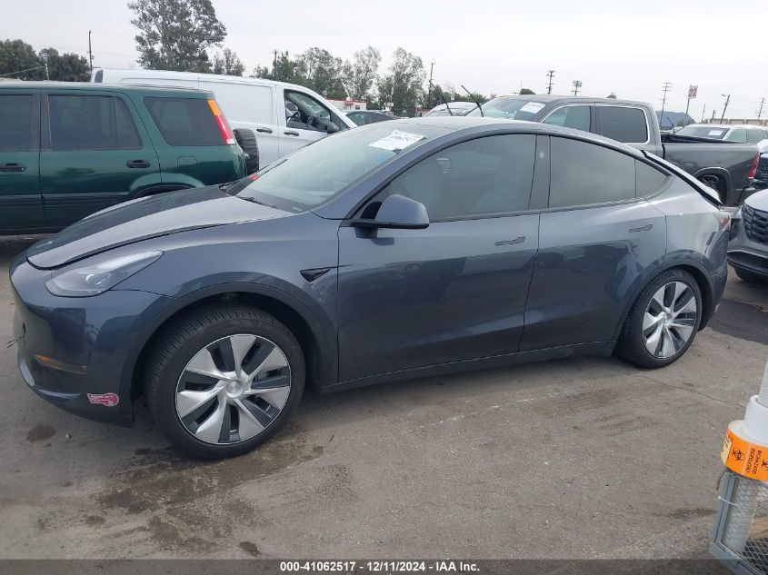 2023 Tesla Model Y Awd/Long Range Dual Motor All-Wheel Drive VIN: 7SAYGDEE0PF884546 Lot: 41062517