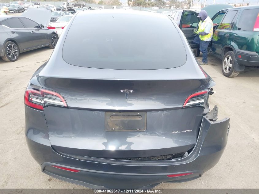 2023 Tesla Model Y Awd/Long Range Dual Motor All-Wheel Drive VIN: 7SAYGDEE0PF884546 Lot: 41062517