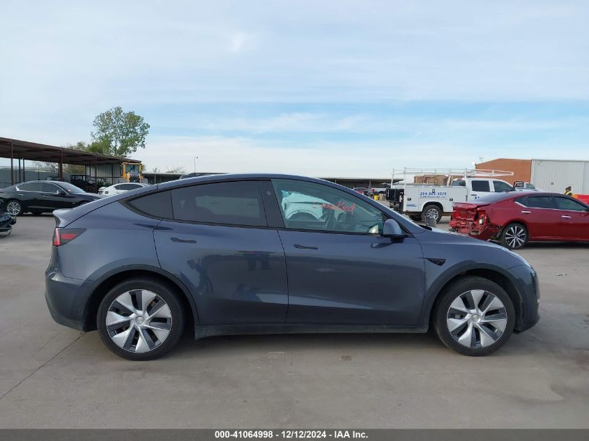 2023 Tesla Model Y Awd/Long Range Dual Motor All-Wheel Drive VIN: 7SAYGDEE0PA170249 Lot: 41064998