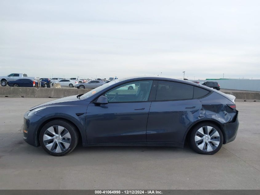 2023 Tesla Model Y Awd/Long Range Dual Motor All-Wheel Drive VIN: 7SAYGDEE0PA170249 Lot: 41064998