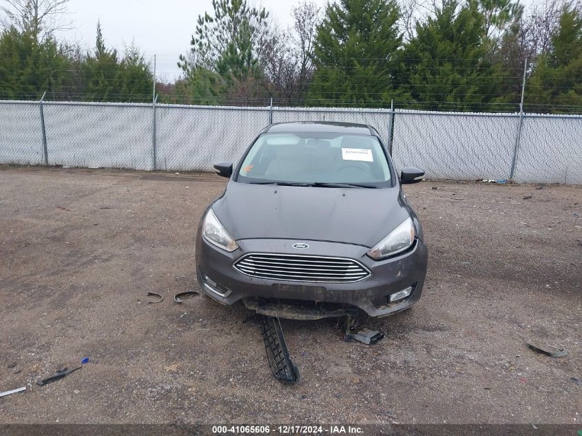 VIN 1FADP3N25GL302634 2016 Ford Focus, Titanium no.12