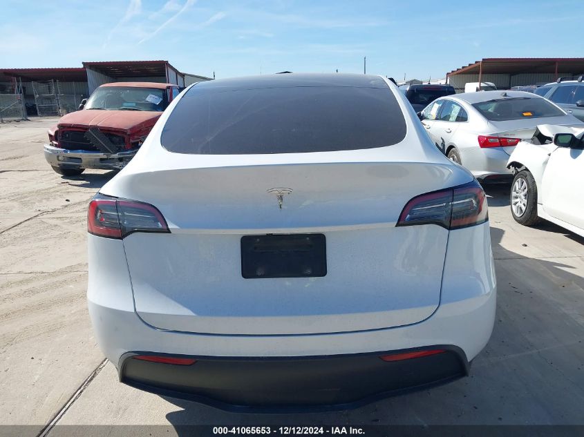 2023 Tesla Model Y Awd/Long Range Dual Motor All-Wheel Drive VIN: 7SAYGAEEXPF663809 Lot: 41065653