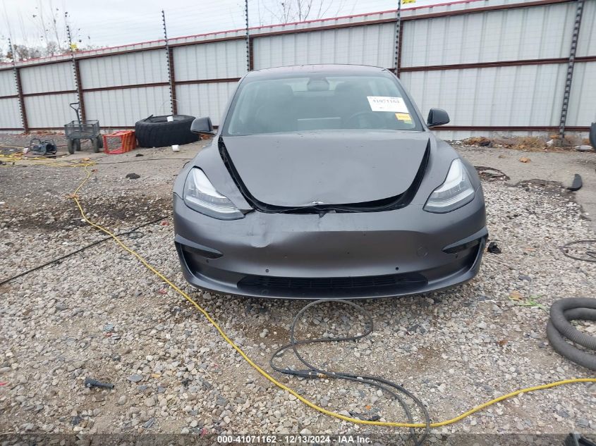 2018 Tesla Model 3 Long Range/Performance VIN: 5YJ3E1EBXJF067979 Lot: 41071162