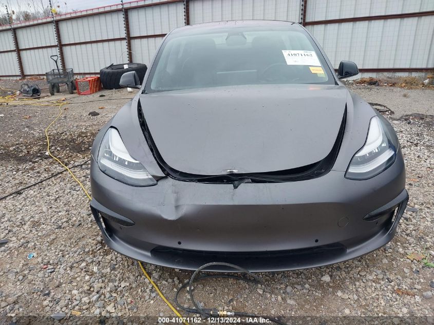 2018 Tesla Model 3 Long Range/Performance VIN: 5YJ3E1EBXJF067979 Lot: 41071162