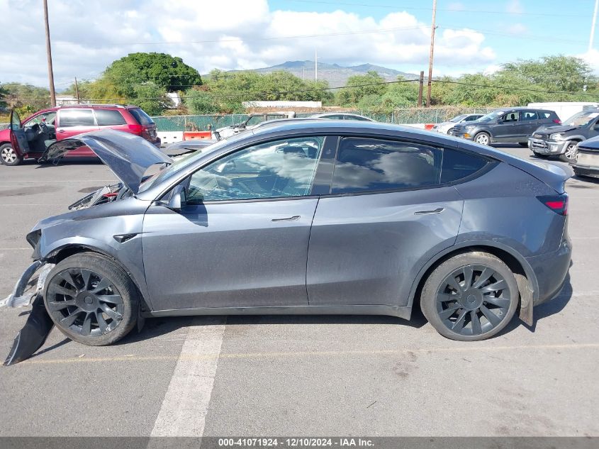 2023 Tesla Model Y Awd/Long Range Dual Motor All-Wheel Drive VIN: 7SAYGAEE4PF945847 Lot: 41071924