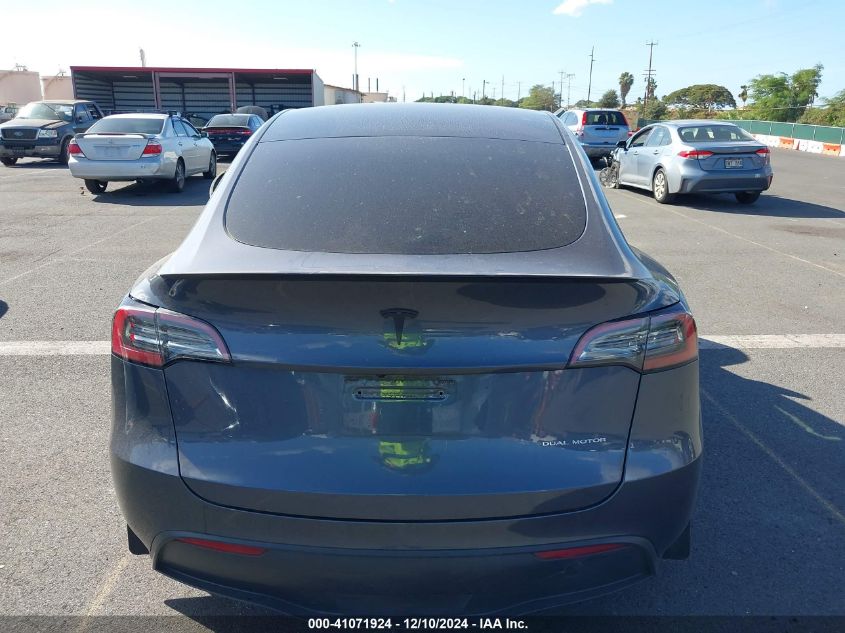 2023 Tesla Model Y Awd/Long Range Dual Motor All-Wheel Drive VIN: 7SAYGAEE4PF945847 Lot: 41071924