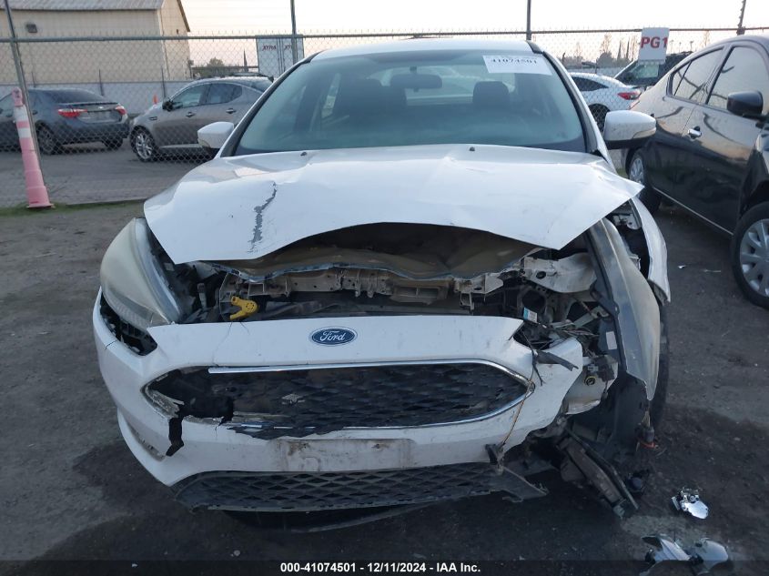 VIN 1FADP3FE4FL375615 2015 FORD FOCUS no.12