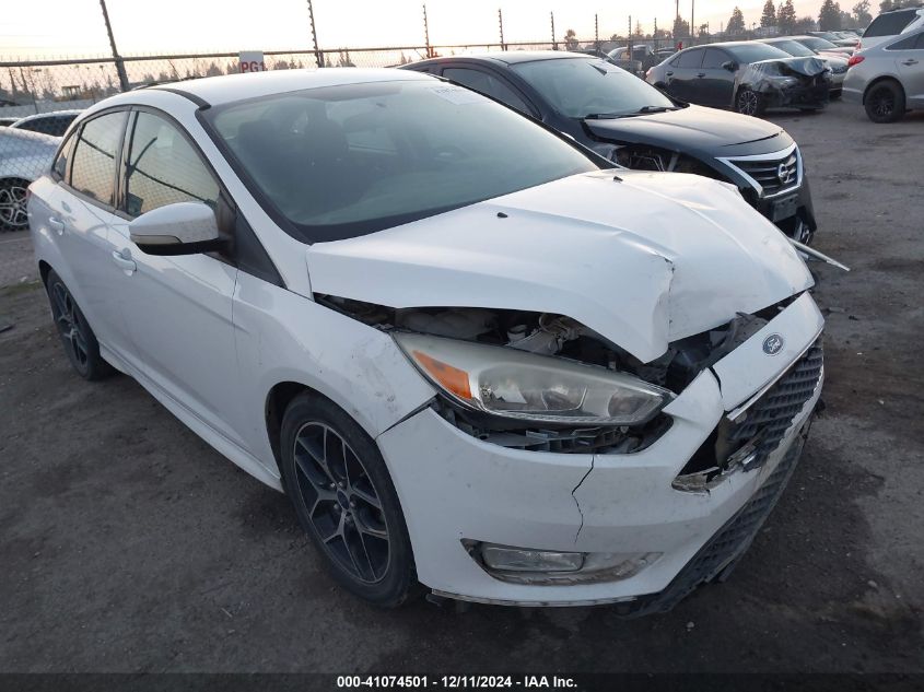 VIN 1FADP3FE4FL375615 2015 FORD FOCUS no.1