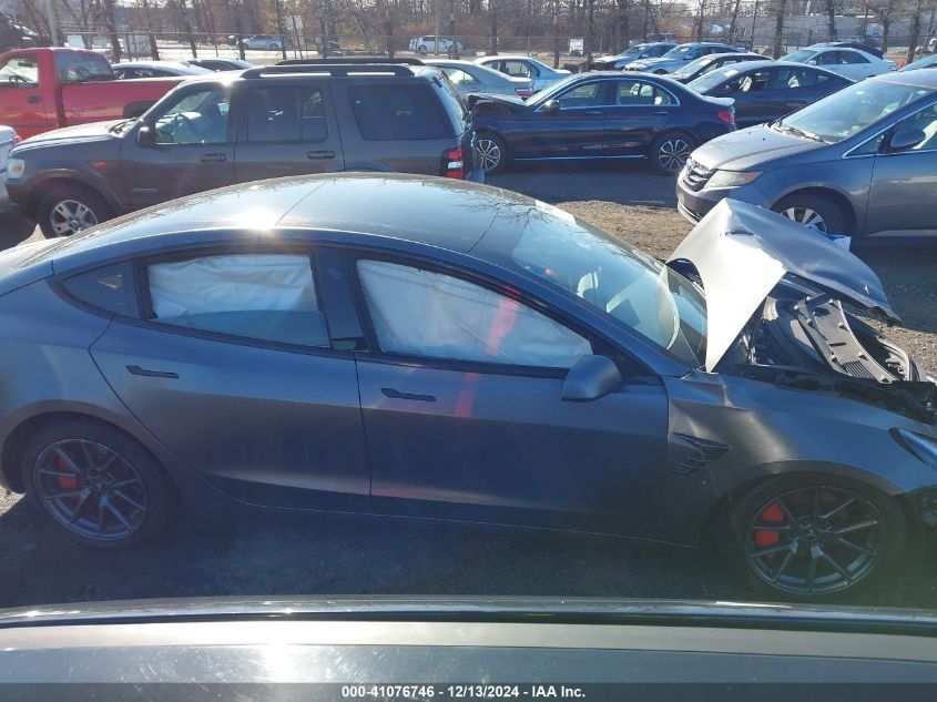 2021 Tesla Model 3 Standard Range Plus Rear-Wheel Drive VIN: 5YJ3E1EA9MF915135 Lot: 41076746