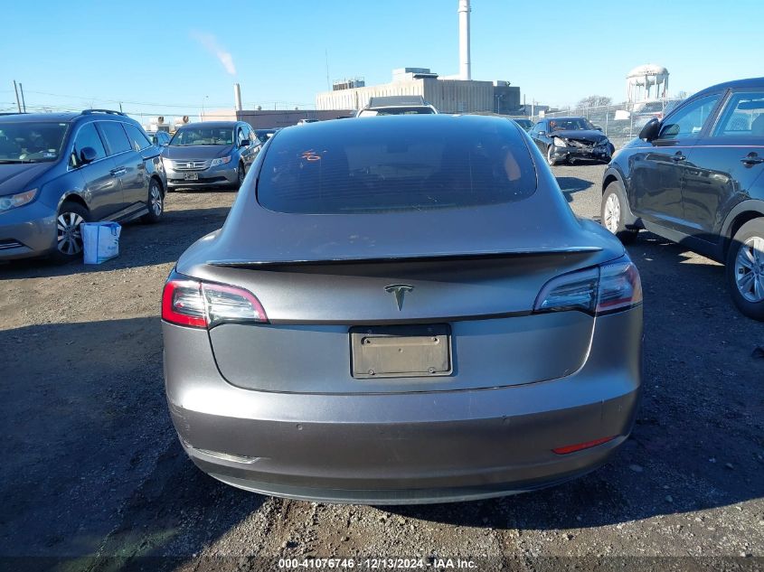 2021 Tesla Model 3 Standard Range Plus Rear-Wheel Drive VIN: 5YJ3E1EA9MF915135 Lot: 41076746