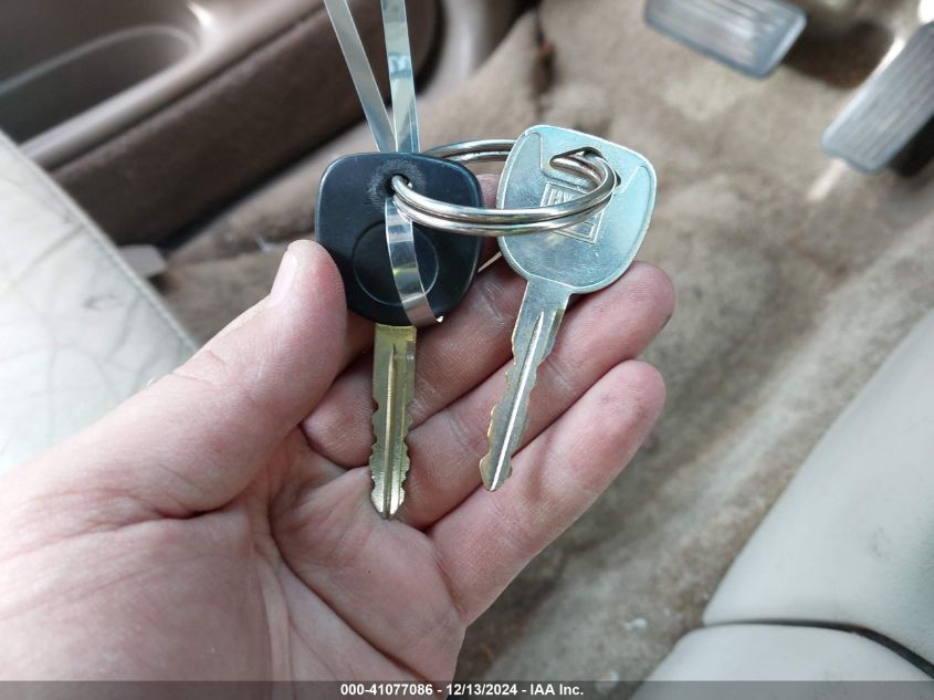 2002 Chevrolet Suburban 1500 Lt VIN: 1GNFK16Z42J305909 Lot: 41077086